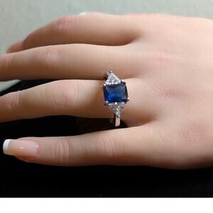 Avon Square Blue Center Stone CZ Trillions Silver Tone Fashion Ring Sz 11